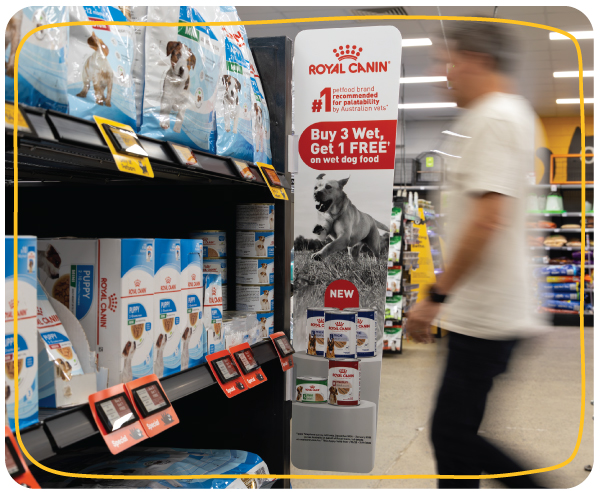 In-store retail media activation at Petbarn featuring point-of-purchase signage and sponsored product placement influencing shopper purchase decisions.